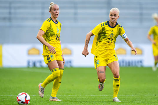 Julia Roddar and Caroline Seger of Sweden