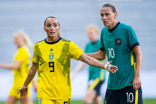 Kosovare Asllani of Sweden and Emily van Egmond of Australia
