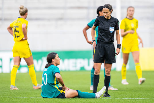 Sam Kerr of Australia and Referee Ivana Martincic
