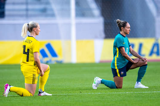 Rebecka Blomqvist of Sweden and Kyah Simon of Australia