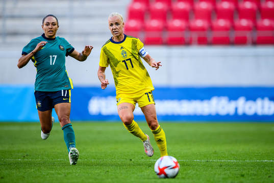 Kyah Simon of Australia and Caroline Seger of Sweden