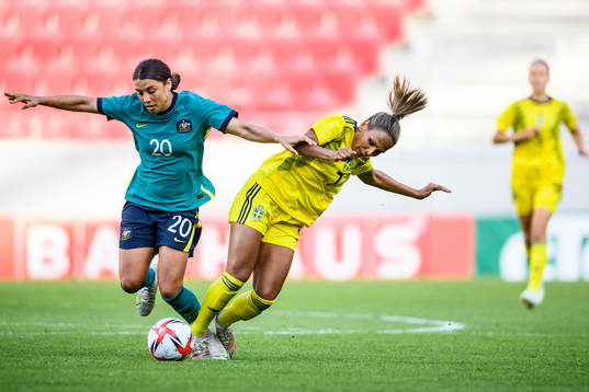 Sam Kerr of Australia and Madelen Janogy of Sweden