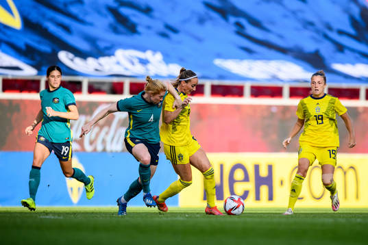 Clare Polkinghorne of Australia and Kosovare Asllani of