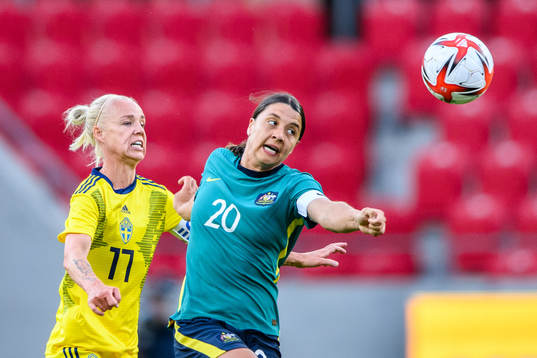 Caroline Seger of Sweden and Sam Kerr of Australia