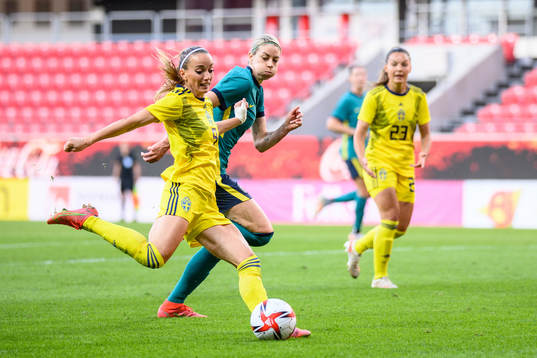 Kosovare Asllani of Sweden and Alanna Kennedy of Australia