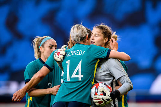 Alanna Kennedy and goalkeeper Teagan Micah of Australia