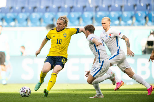 Emil Forsberg of Sweden and Patrik Hrosovsky of Slovakia