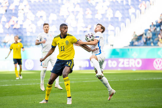 Alexander Isak of Sweden and Patrik Hrosovsky of Slovakia