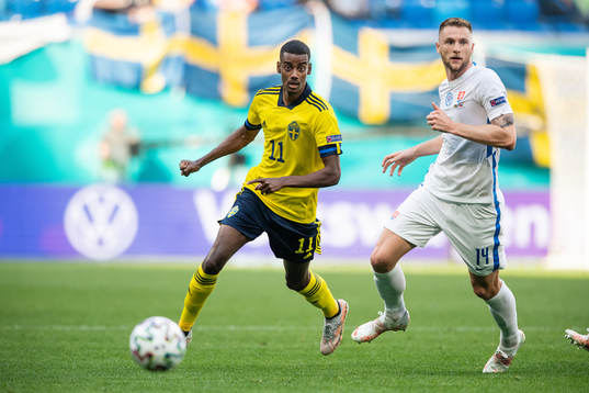 Alexander Isak of Sweden and Milan Skriniar of Slovakia