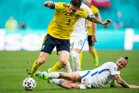 Victor Nilsson Lindelöf of Sweden and Marek Hamsik of