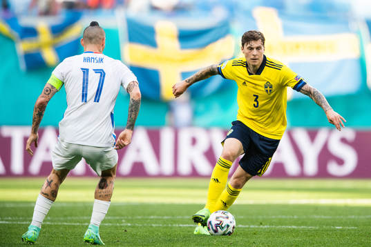 Marek Hamsik of Slovakia and Victor Nilsson Lindelöf of
