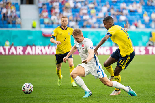 Tomas Hubocan of Slovakia and Alexander Isak of Sweden