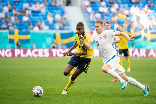 Alexander Isak of Sweden and Tomas Hubocan of Slovakia
