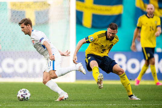 Patrik Hrosovsky of Slovakia and Marcus Berg of Sweden
