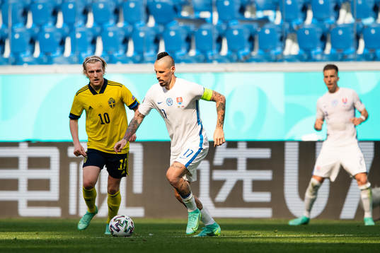 Emil Forsberg of Sweden and Marek Hamsik of Slovakia