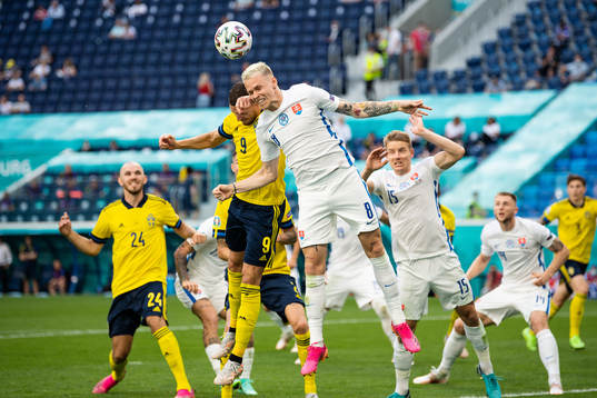 Marcus Berg of Sweden and Ondrej Duda of Slovakia