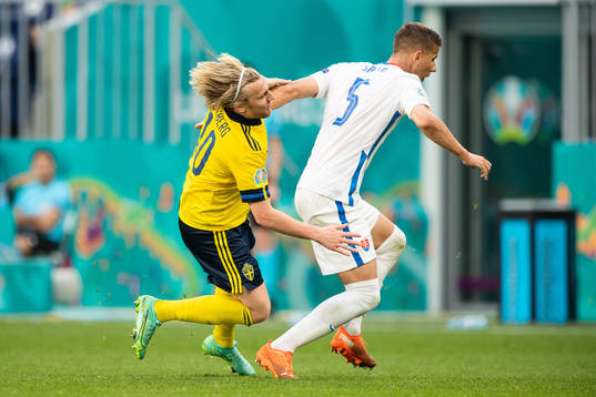 Emil Forsberg of Sweden and Lubomir Satka of Slovakia