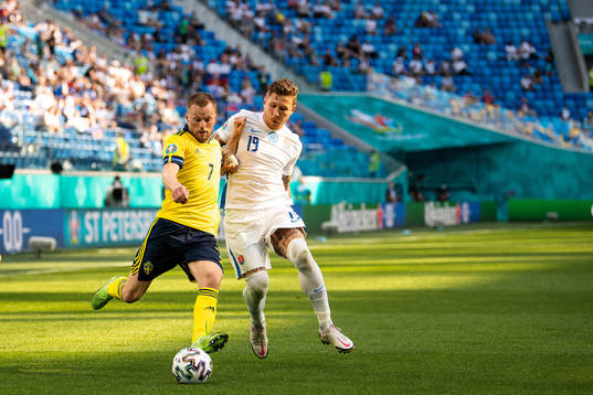 Sebastian Larsson of Sweden and Juraj Kucka of Slovakia