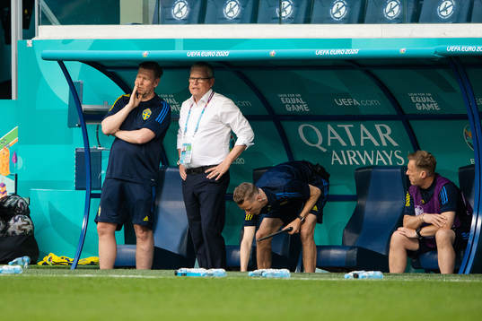assistant coach Peter Wettergren and head coach Janne