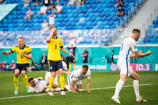 Ludwig Augustinsson and Marcus Berg of Sweden looks dejected