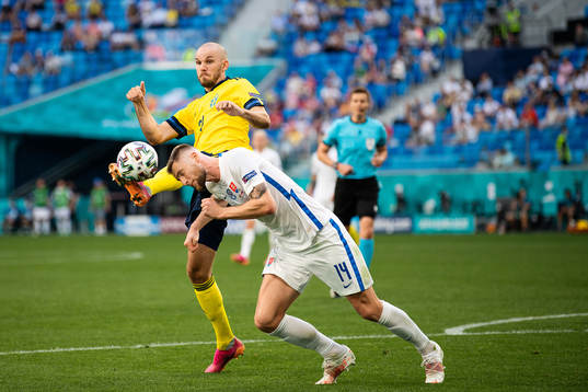 Marcus Danielson of Sweden and Milan Skriniar of Slovakia