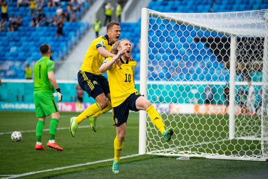 Viktor Claesson and Emil Forsberg of Sweden celebrate