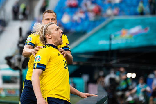 Viktor Claesson and Emil Forsberg of Sweden celebrate