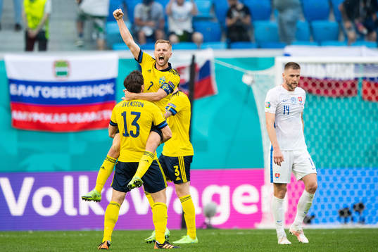 Gustav Svensson and Sebastian Larsson of Sweden celebrate