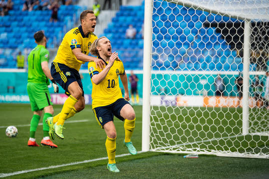 Viktor Claesson and Emil Forsberg of Sweden celebrate