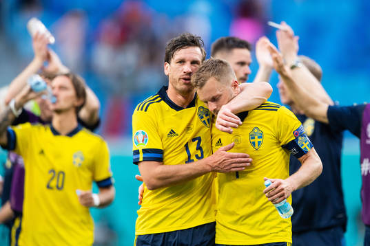 Gustav Svensson and Sebastian Larsson of Sweden celebrate