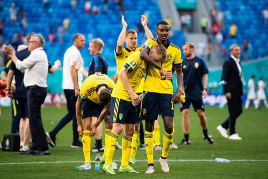 Sebastian Larsson and Alexander Isak of Sweden celebrate
