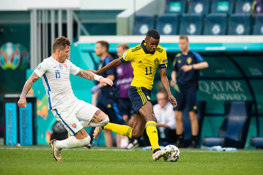 Juraj Kucka of Slovakia and Alexander Isak of Sweden