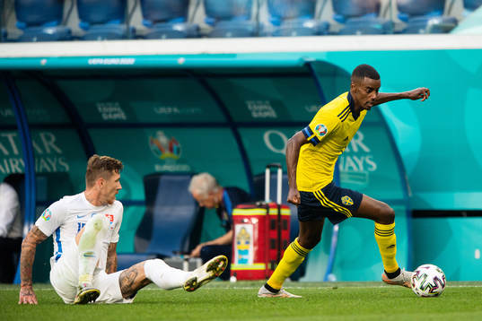 Juraj Kucka of Slovakia and Alexander Isak of Sweden