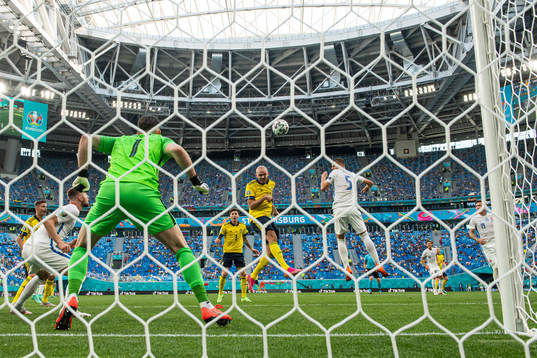 Marcus Danielson of Sweden with a header towards goalkeeper