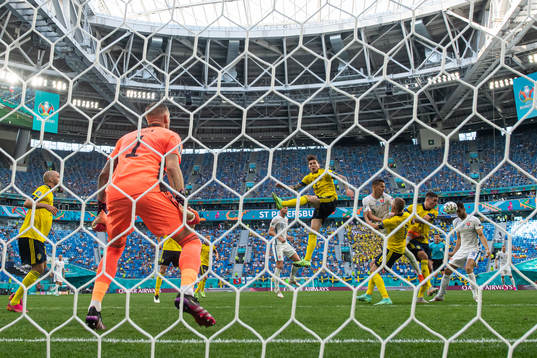 Goalkeeper Robin Olsen sees Victor Nilsson Lindelöf,