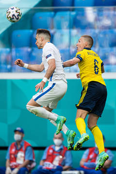 Peter Pekarik of Slovakia and Ludwig Augustinsson of Sweden
