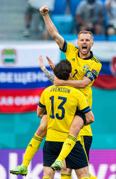 Gustav Svensson and Sebastian Larsson of Sweden celebrate