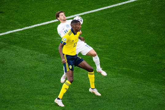 Alexander Isak of Sweden and Patrik Hrosovsky of Slovakia
