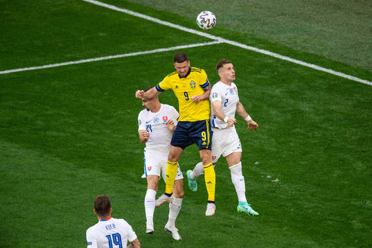 Marcus Berg of Sweden against Peter Pekarik and Martin