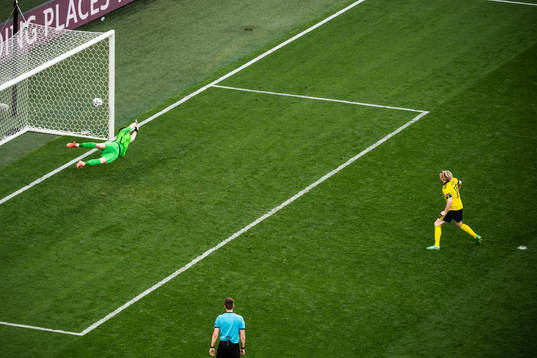Emil Forsberg of Sweden scores 1-0 behind goalkeeper Martin