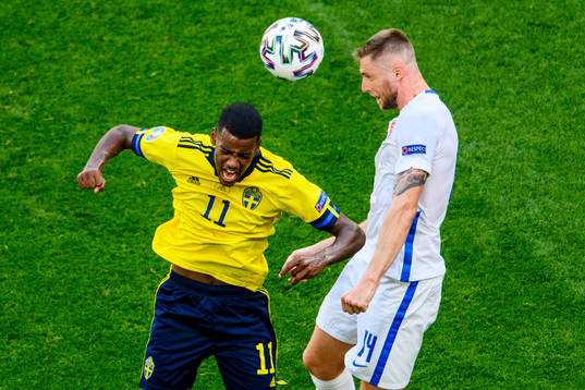 Alexander Isak of Sweden and Milan Skriniar of Slovakia