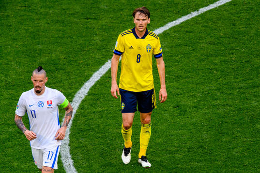 Marek Hamsik of Slovakia and Albin Ekdal of Sweden