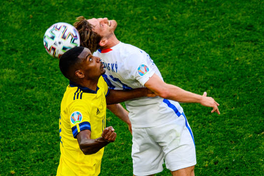 Alexander Isak of Sweden and Patrik Hrosovsky of Slovakia