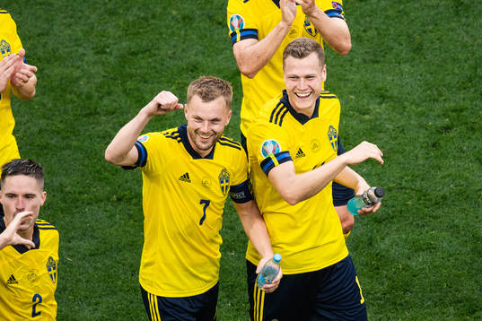 Sebastian Larsson and Viktor Claesson of Sweden celebrate