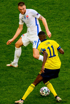 Alexander Isak of Sweden and Milan Skriniar of Slovakia