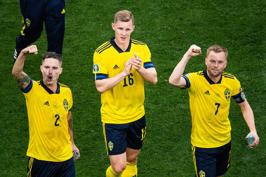Mikael Lustig. Emil Krafth and Sebastian Larsson of Sweden