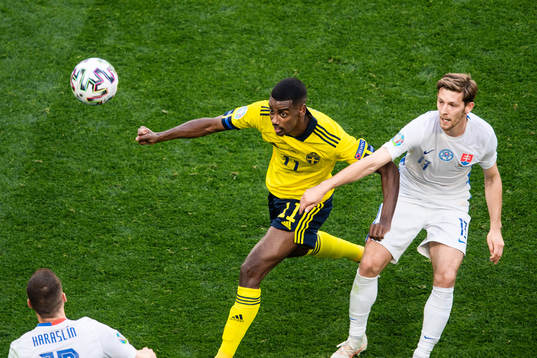 Alexander Isak of Sweden and Patrik Hrosovsky of Slovakia