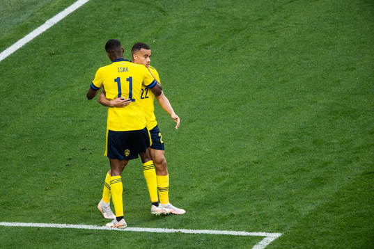 Robin Quaison and Alexander Isak of Sweden celebrate