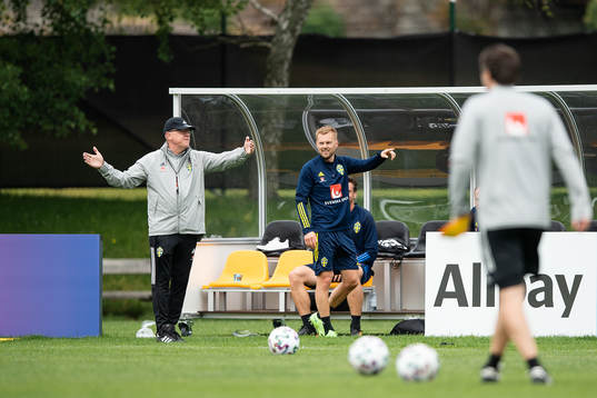 head coach Janne Andersson and Sebastian Larsson of the