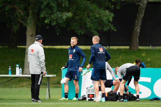 head coach Janne Andersson and Sebastian Larsson of the